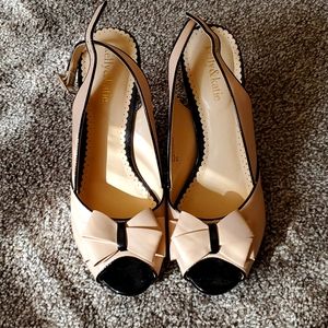 Tan and black heels. Size 8.5